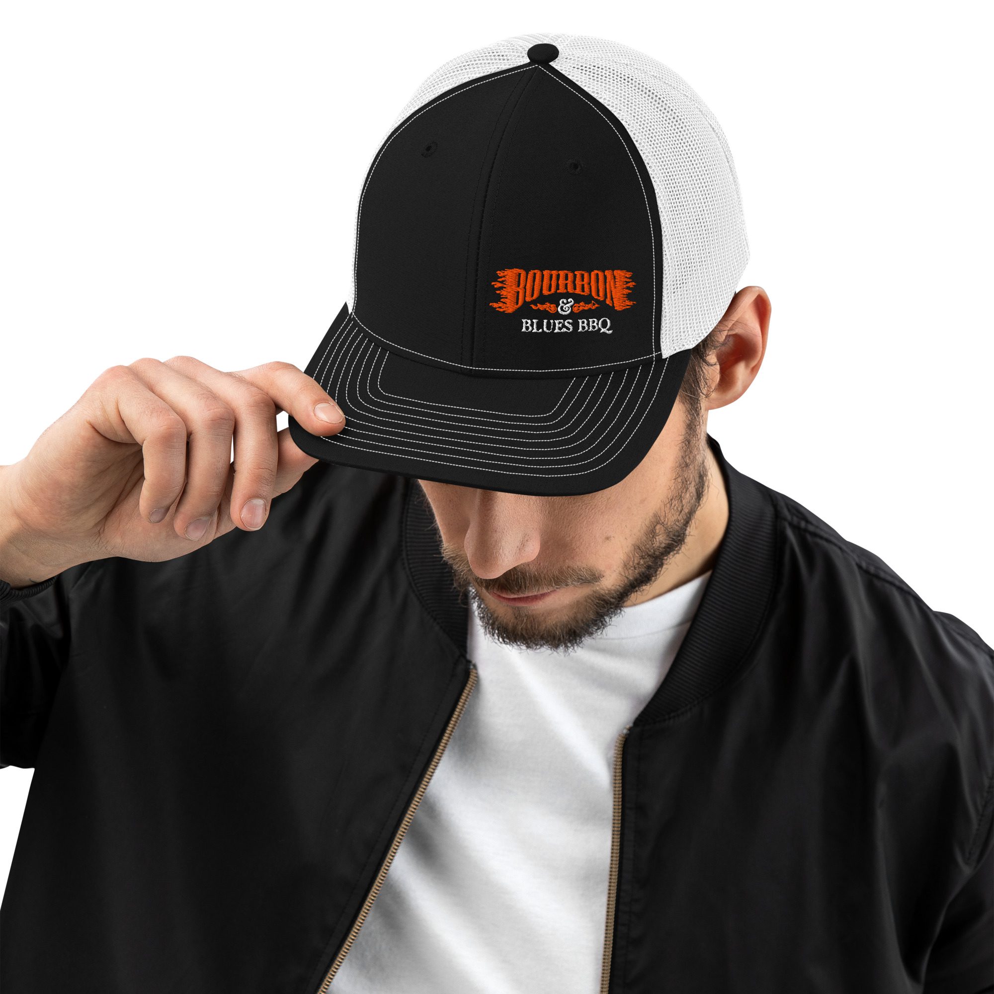 Black and white Signature Logo Trucker Hat with embroidered Bourbon & Blues BBQ logo